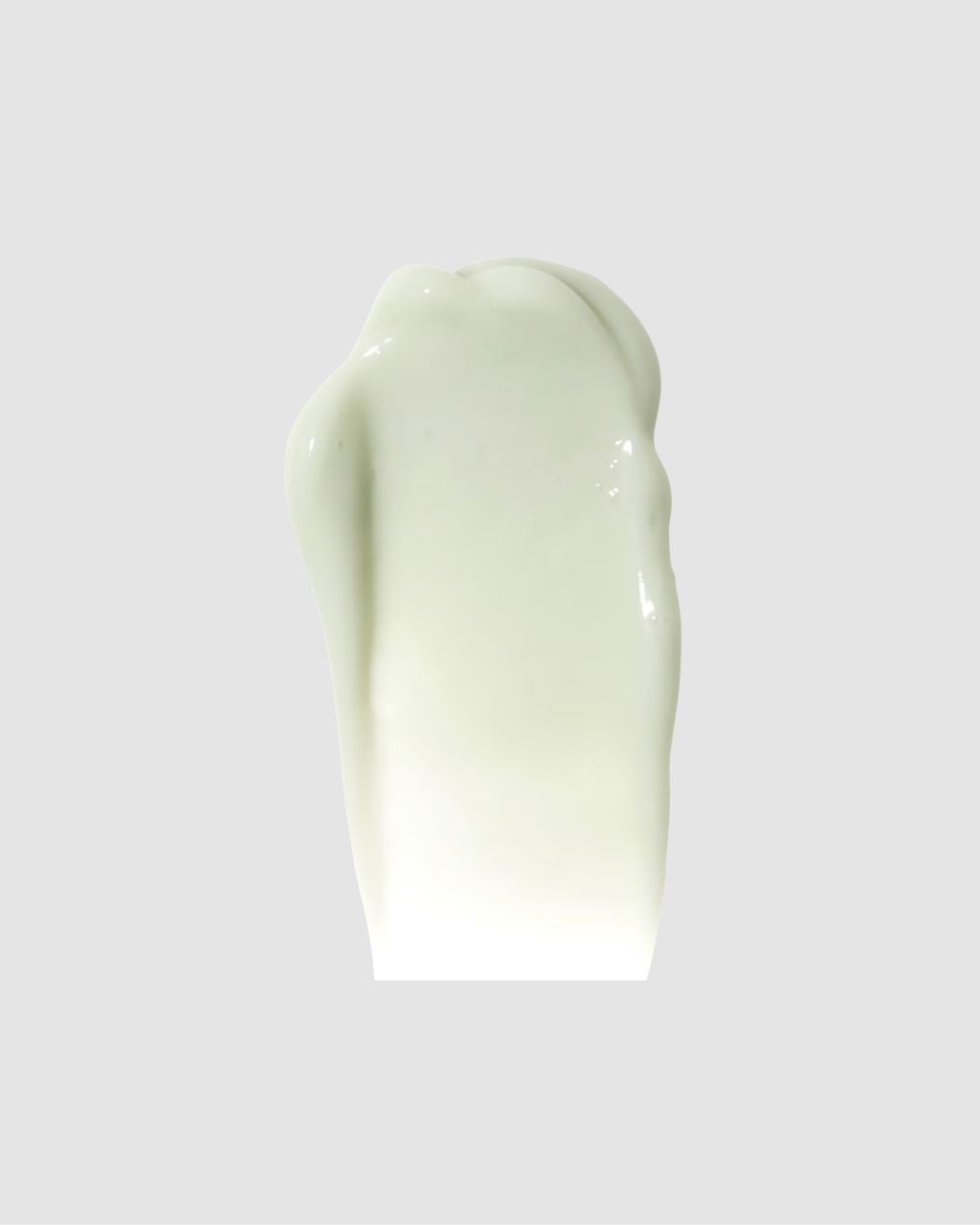 White cream swatch on a gray background