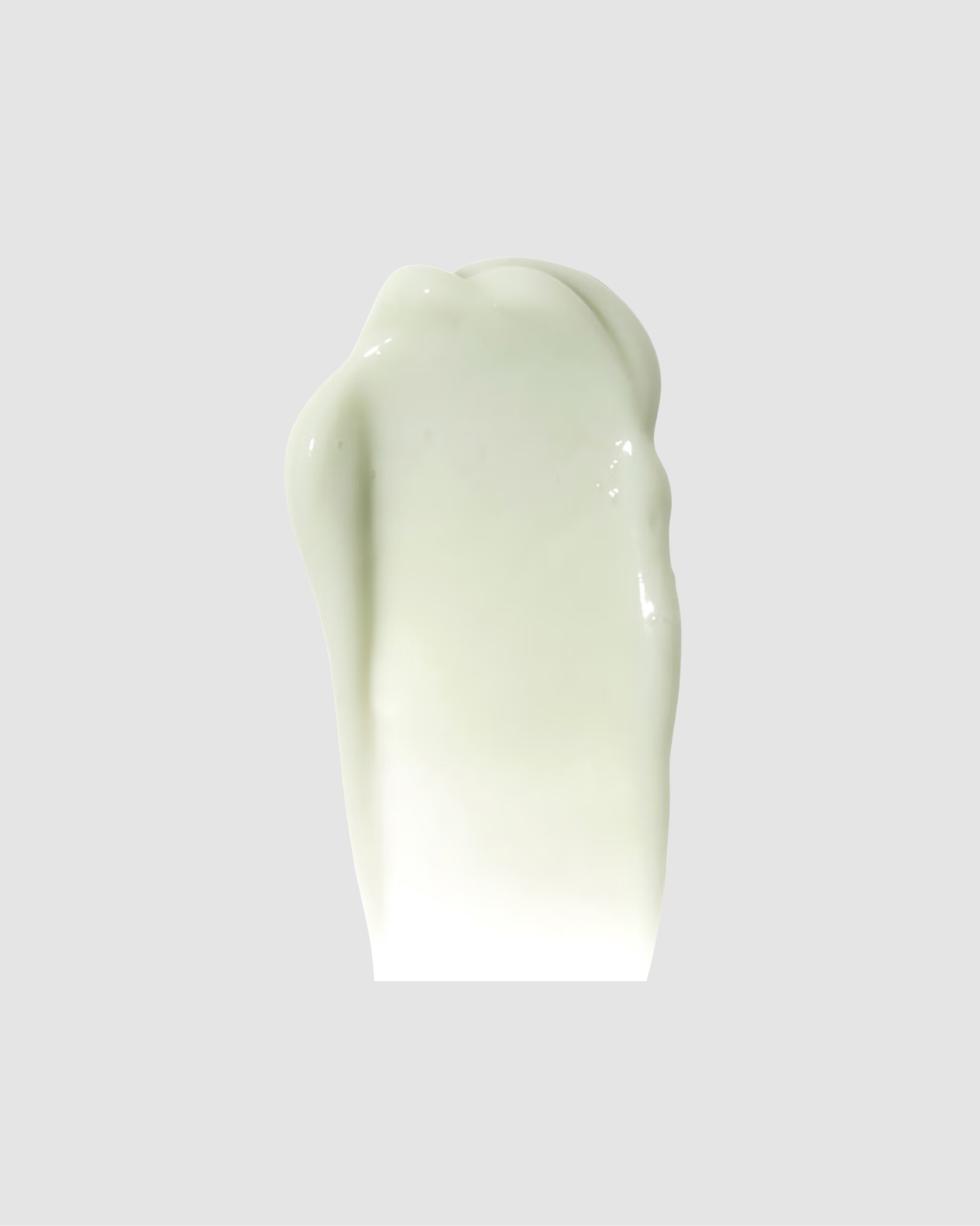 White cream swatch on a gray background