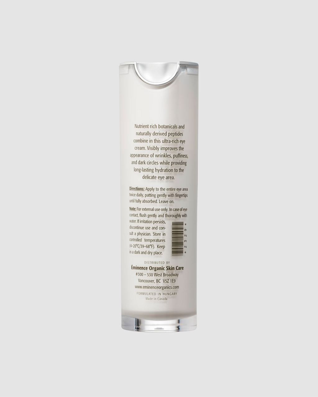 Skincare bottle with label on a light gray background