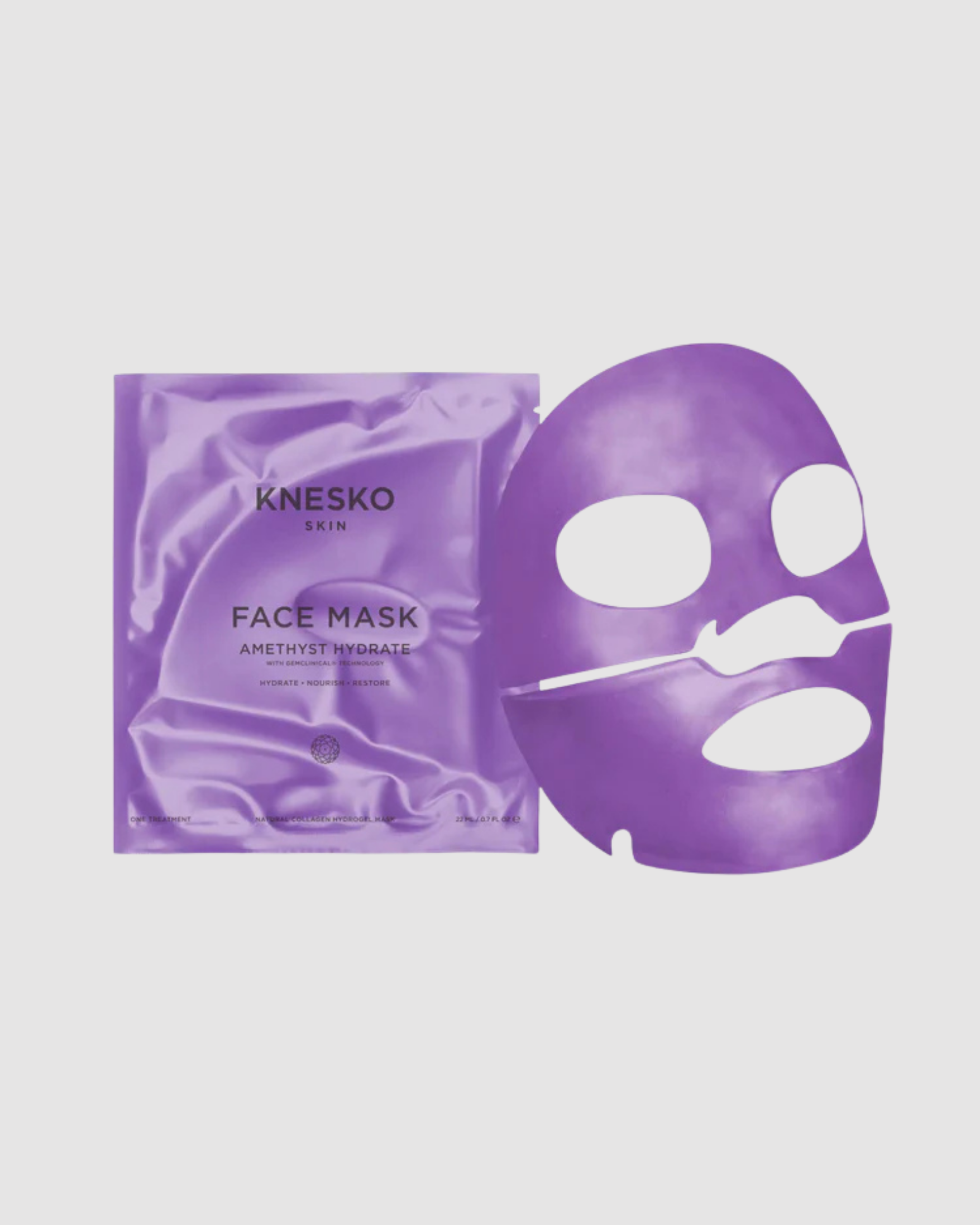 Purple face mask with packaging on a light gray background