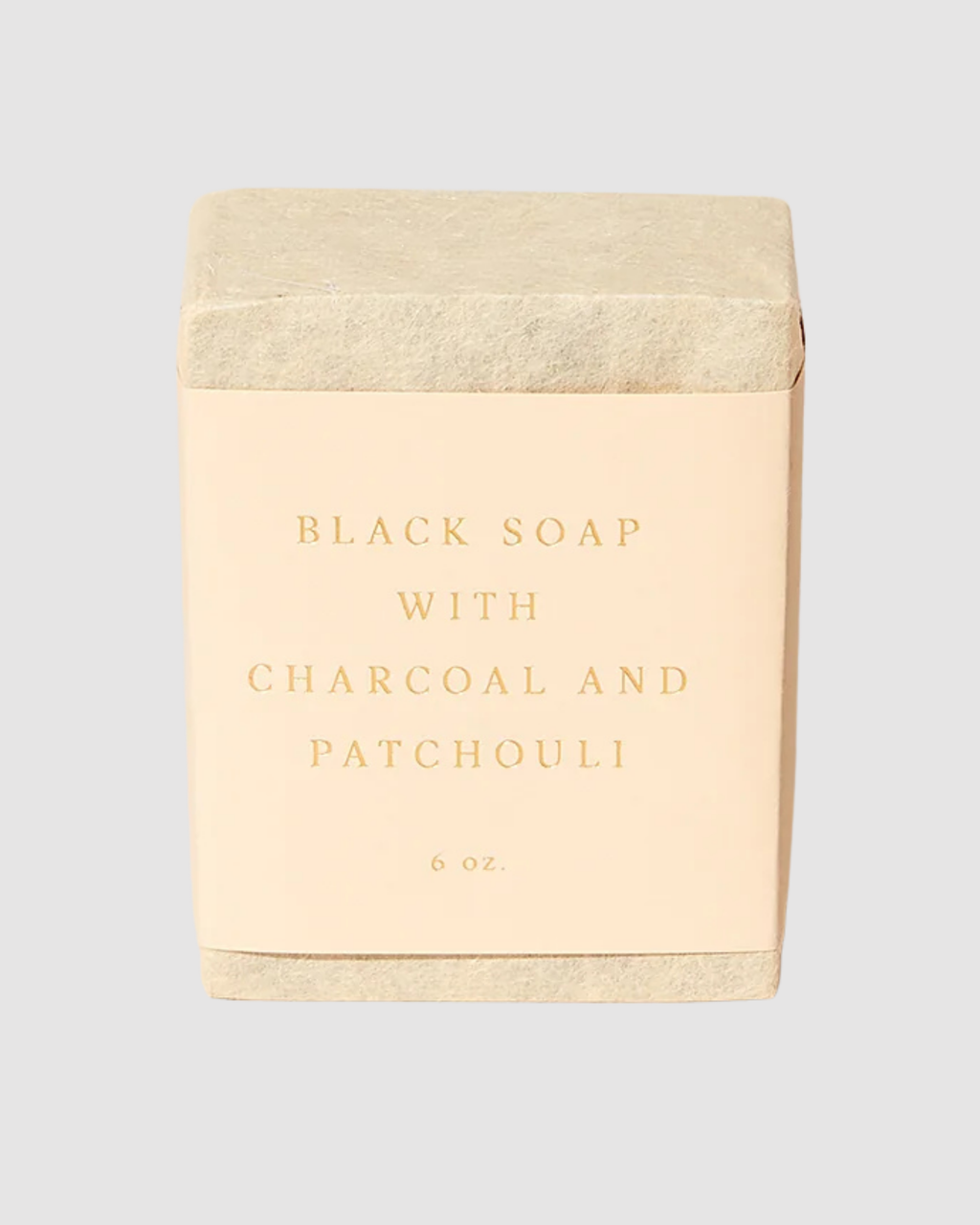 Bar of black soap with charcoal and patchouli by SAIPUA