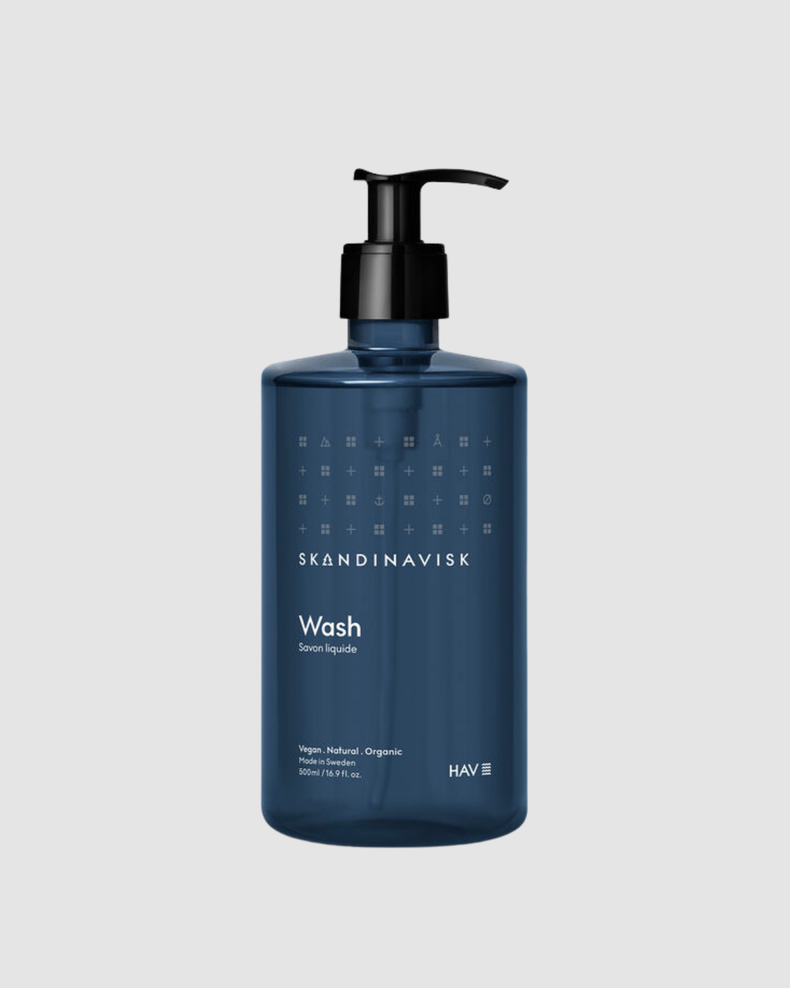 Blue bottle of Skandinavisk Hav Hand Wash on a light gray background
