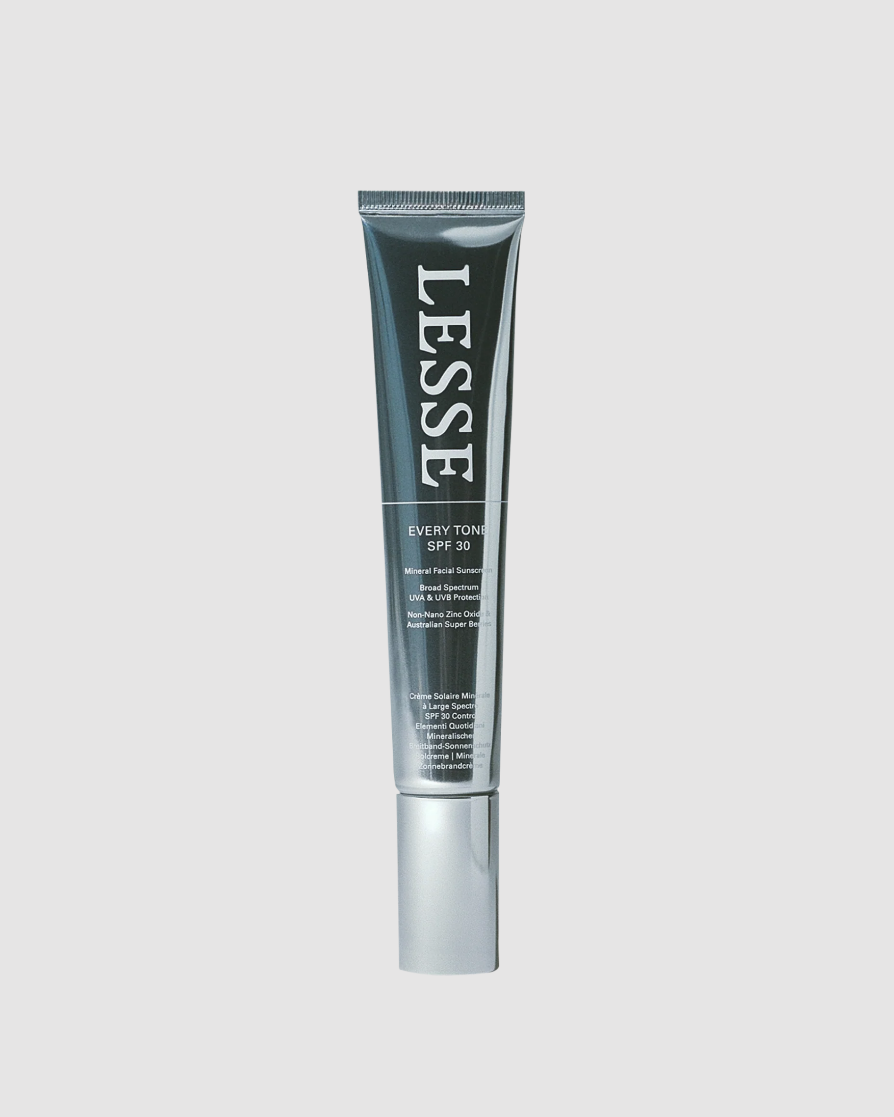 Lesse SPF product tube on a light gray background