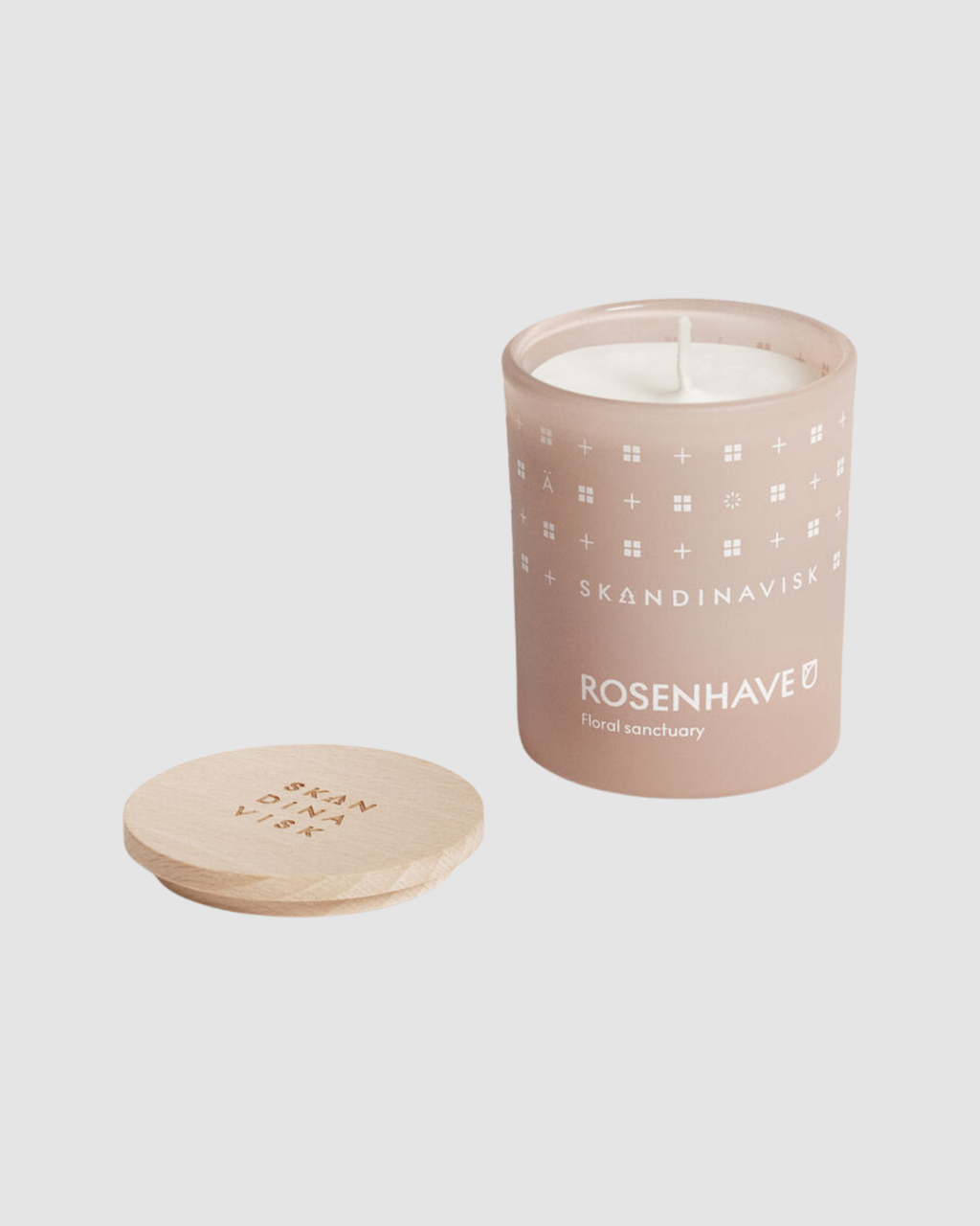 Skandinavisk candle with lid on a light gray background