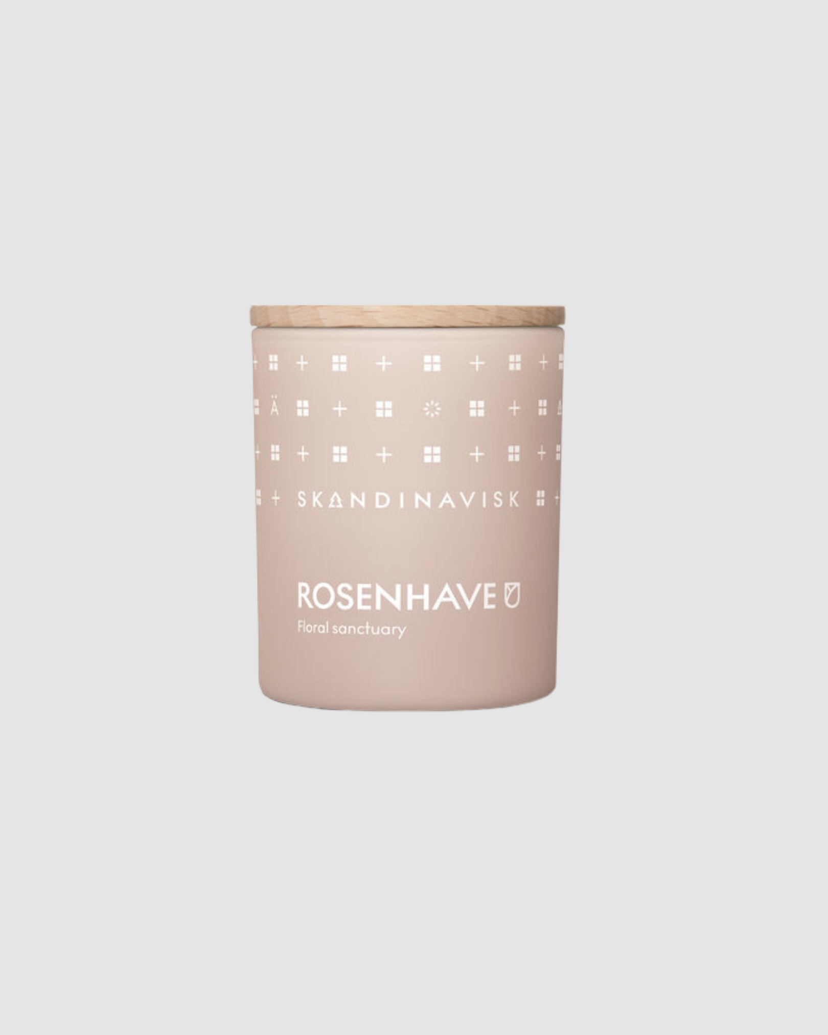 Skandinavisk candle with wooden lid on a light gray background