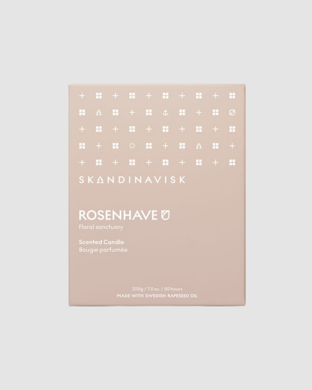 SkØndinavisk Rosenhäve scented candle packaging on a light beige background