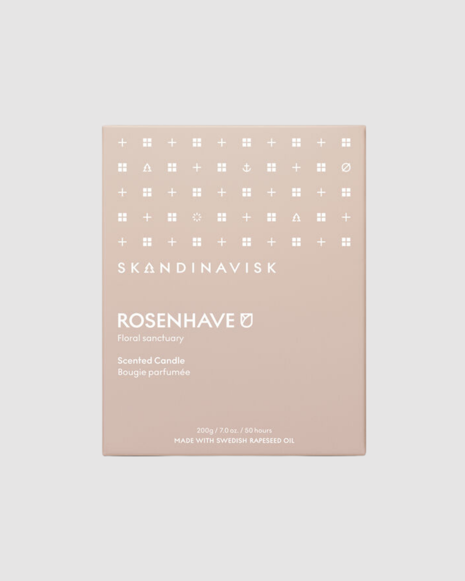 SkØndinavisk Rosenhäve scented candle packaging on a light beige background