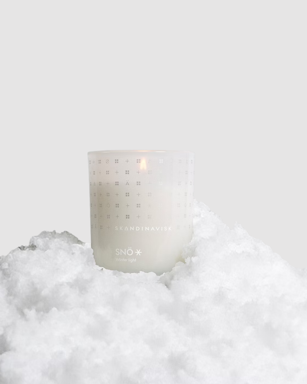 Candle with a brand logo on a white background